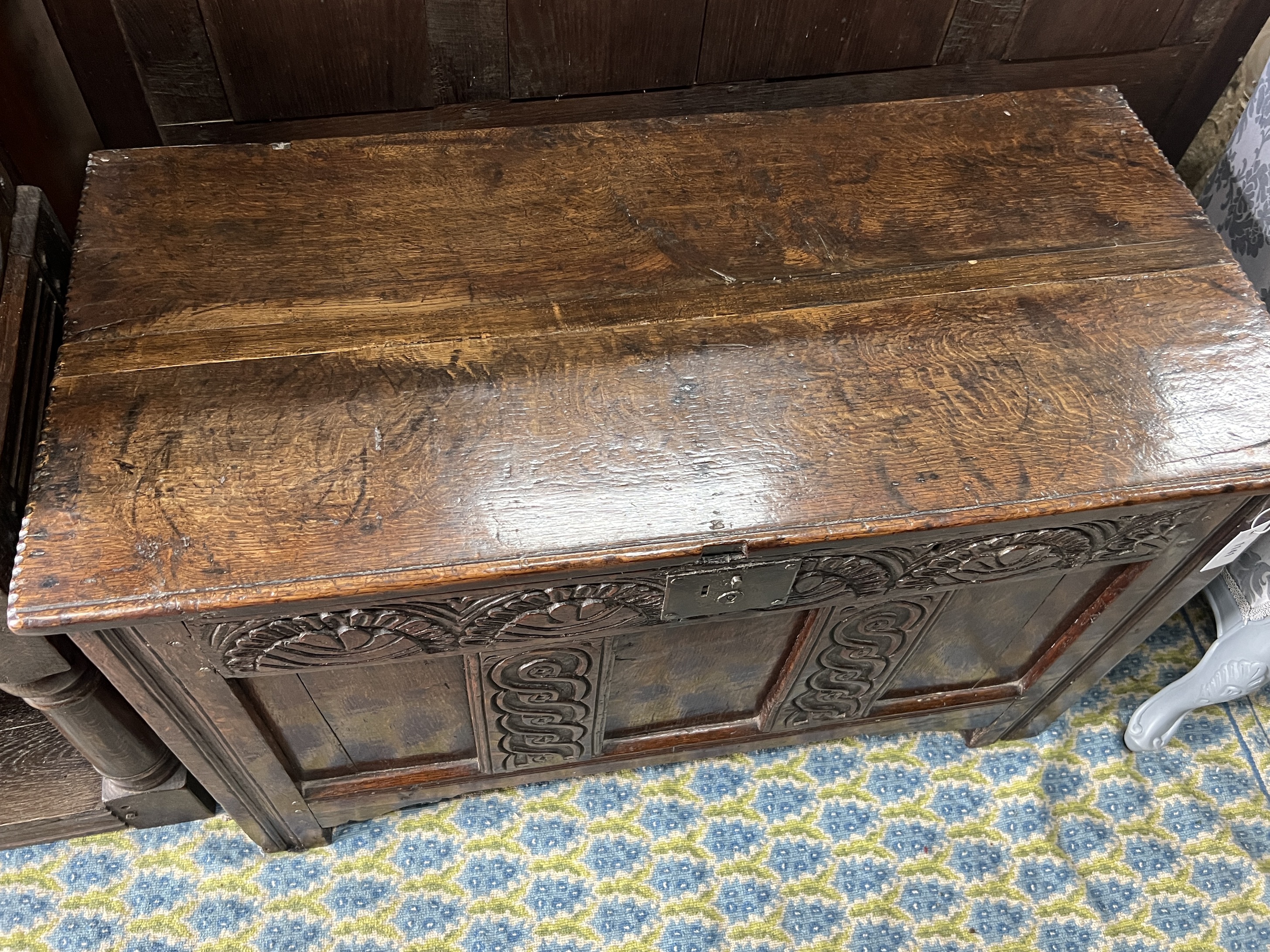 A 17th century oak coffer, width 102cm, depth 48cm, height 63cm
